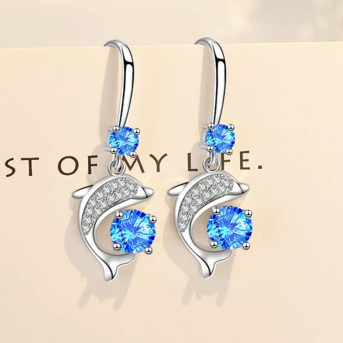 Oorbellen dolfijnen met strass blauw