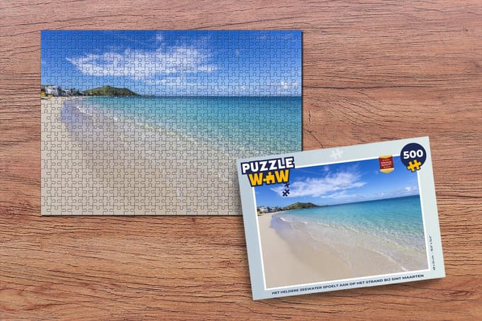 Puzzel Het heldere zeewater spoelt aan op het strand bij Sint Maarten - Legpuzzel - Puzzel 500 stukjes