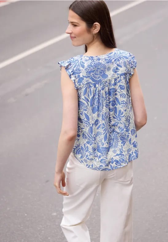 Blousetop met gespleten hals en volants