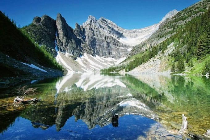Fotobehang - Lake Agnes 375x250cm - Vliesbehang
