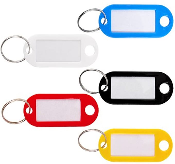 CM Sleutelhangers/labels - kunststof - multi kleur - 20x stuks - met etiket - 5 x 2 cm
