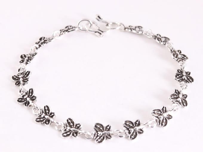 Fijne zilveren armband met vlinders