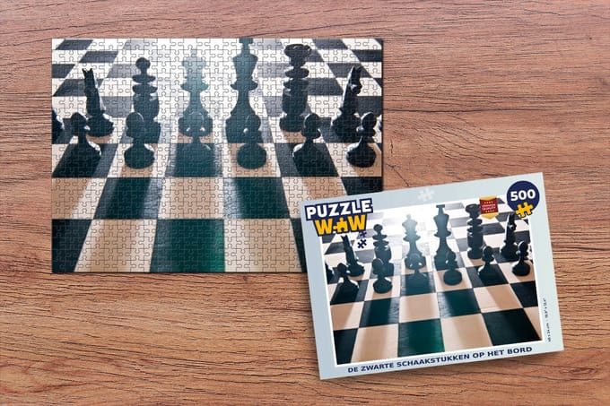 Puzzel De zwarte schaakstukken op het bord - Legpuzzel - Puzzel 500 stukjes