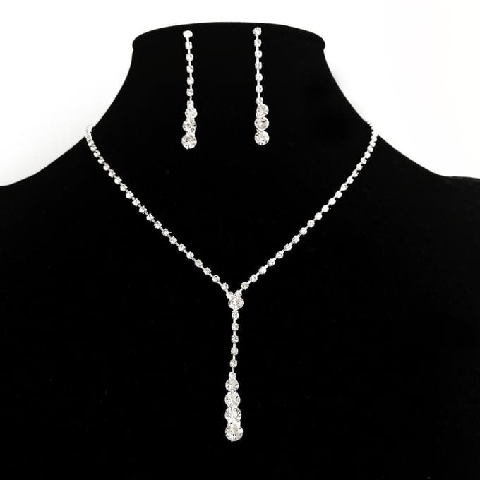 Ensemble de trois pièces de collier, boucles d'oreilles et bracelet en diamants pour mariée or