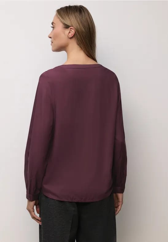 Blouse met glitterdetail