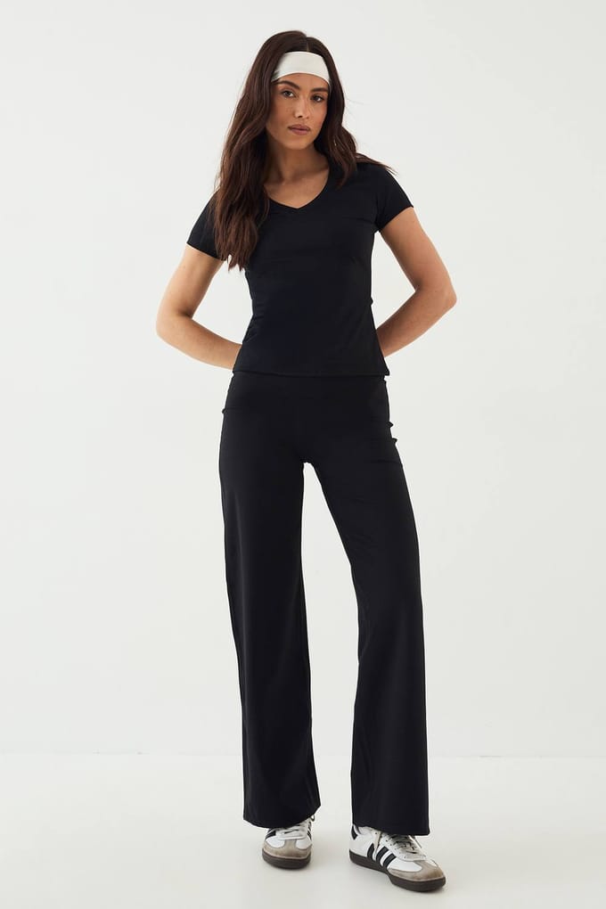 Dames DSGN Studio Ultra Sculpt V-hals Korte Mouw Top | Zwart | Maat: Large
