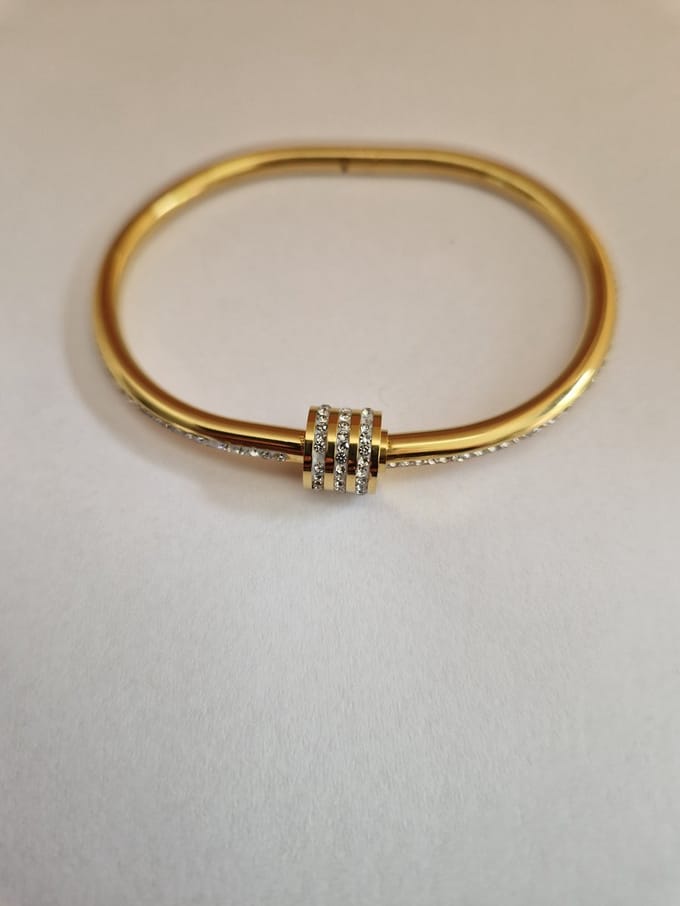 EHH BEAUTY -Luxe dames armband - goudkleur - draaisluiting - met steentjes - Bangle