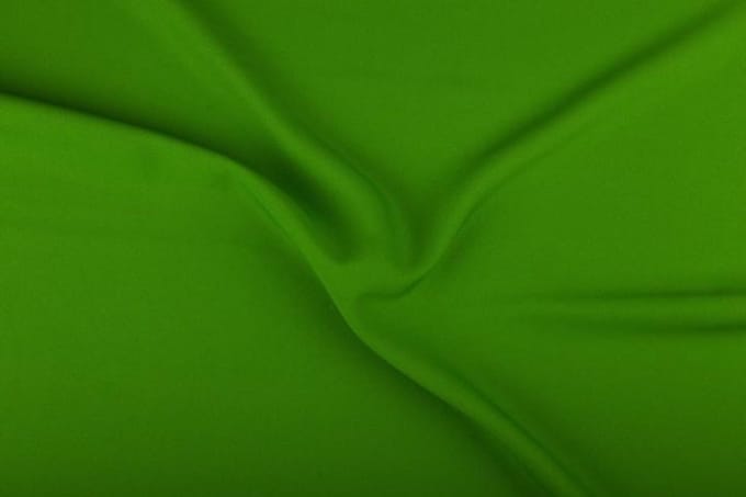 Texture/polyester stof - Middelgroen - 25 meter