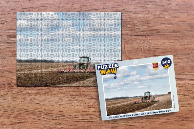 Puzzel De boer met een ploeg achter zijn tractor - Legpuzzel - Puzzel 500 stukjes