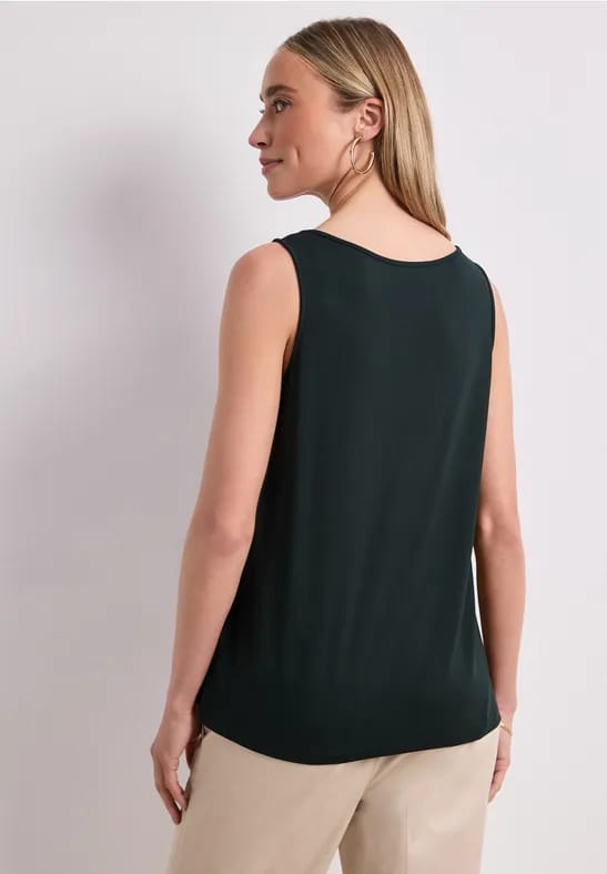Top met V-hals en knoopdetail