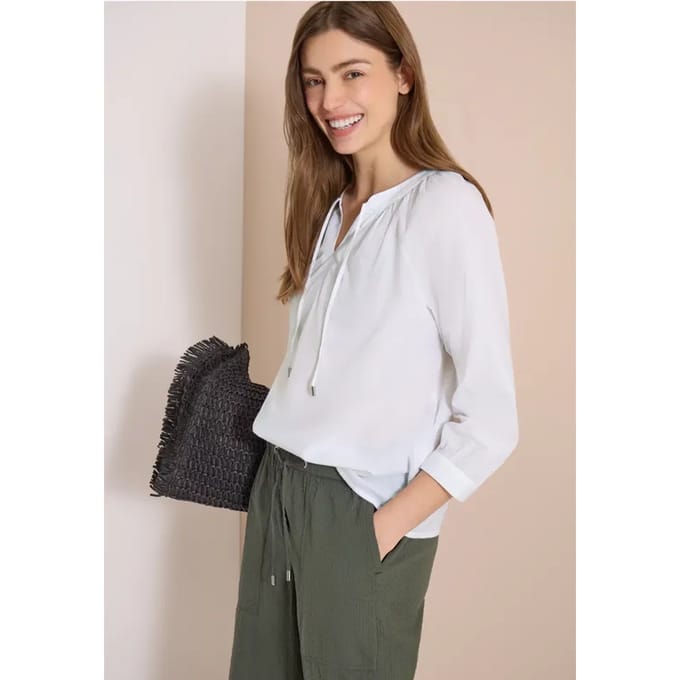 Blouse met 3/4 mouwen en gespleten hals in effen kleur