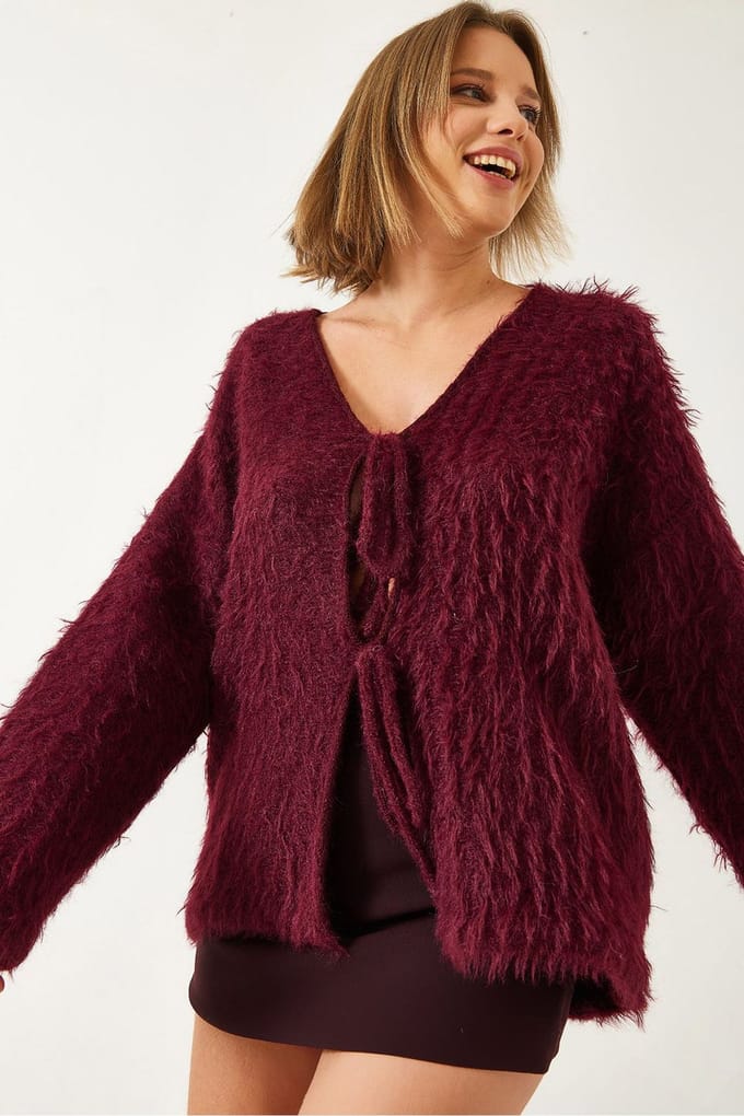 Textuur gebreide V-hals lange cardigan met pompom