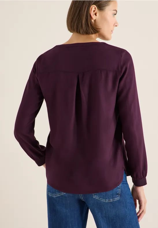 Blouse met glitterdetails