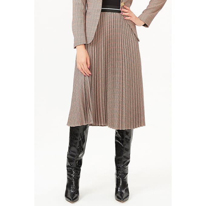 Geplooide rok en contrasterende elastische taille