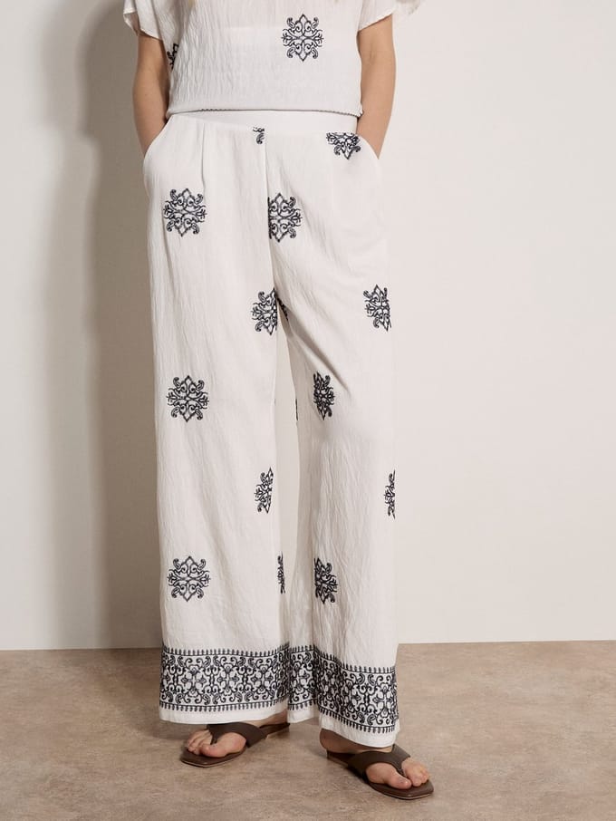 Broek met wijde pijpen en paisley-borduursel