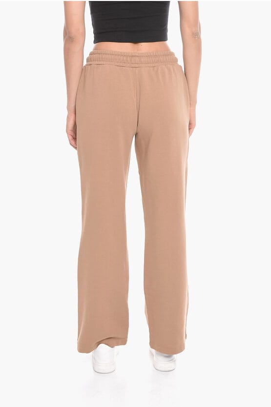 Wijde WORKSHOP-joggingbroek met logoprint in beige