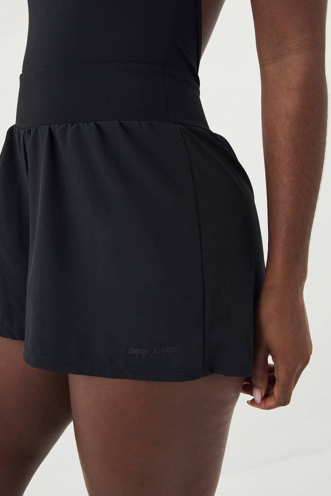 Dames DSGN Studio Cross Back Hardloop Unitard | Black | Maat: XL