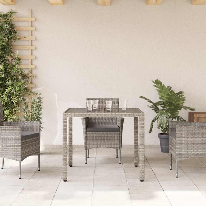 vidaXL Tuintafel met glazen blad 90x90x75 cm poly rattan grijs