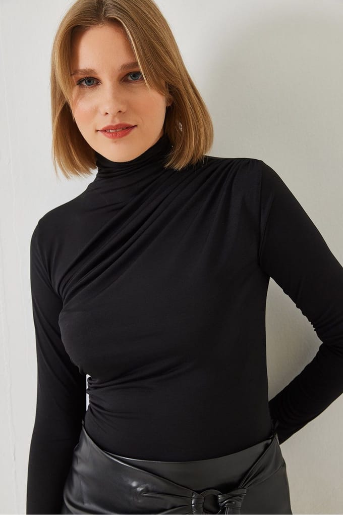 Getailleerde colblouse met ruchesdetail