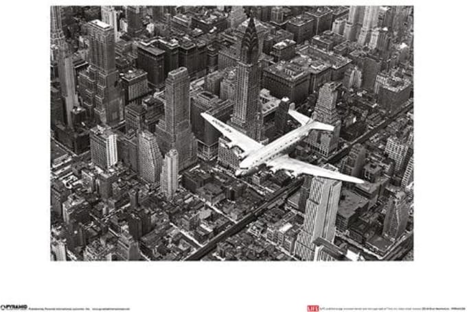 DC-4 over Manhattan