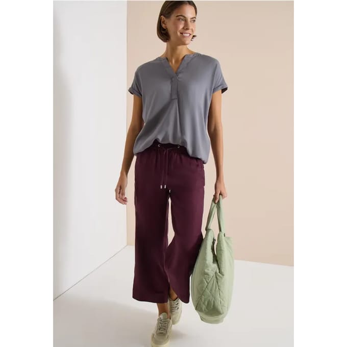 Blouse met korte mouwen en gespleten hals