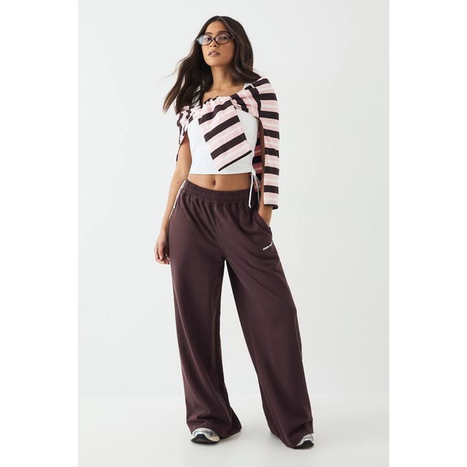 Dames DSGN Studio Joggingbroek met Paspeldetail Middelhoge Taille Wijde Pijpen | Chocoladebruin | Maat: Large