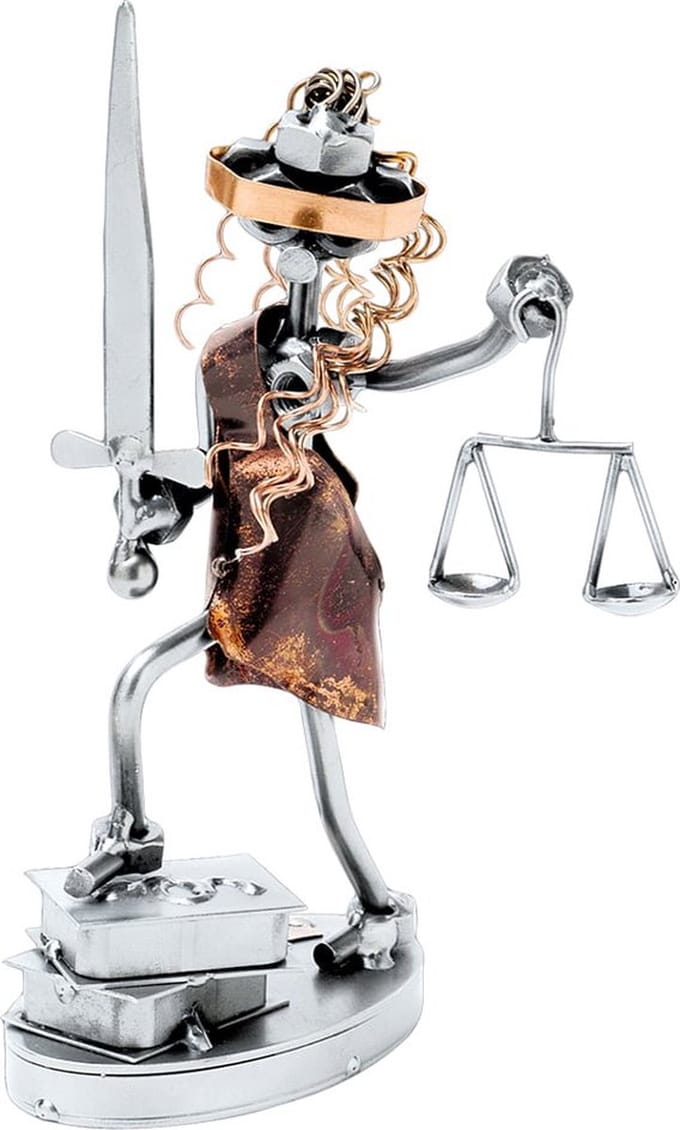 Hinz & Kunst smeedwerkfiguur beroepen "vrouwe justitia"