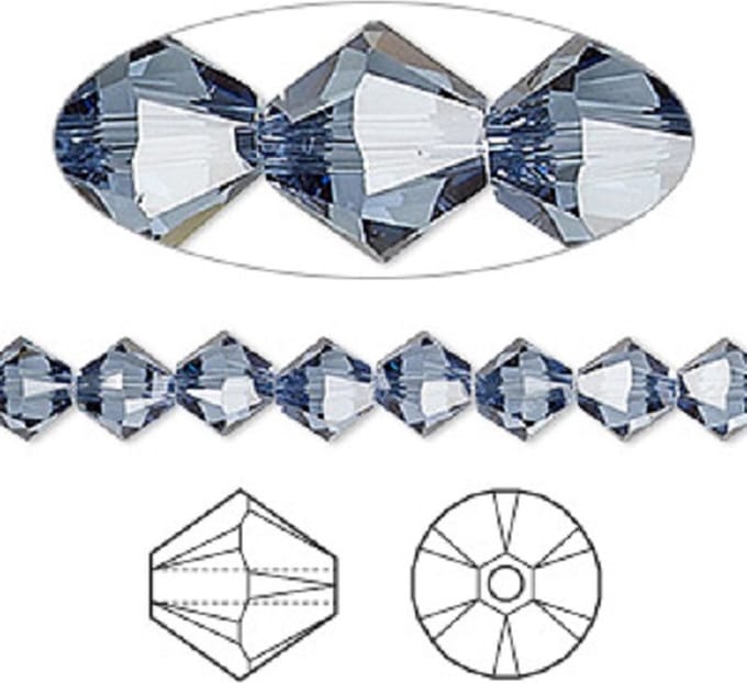 Swarovski Elements, Xilion Bicone (5328), 10mm, denim blue. Per 12 stuks