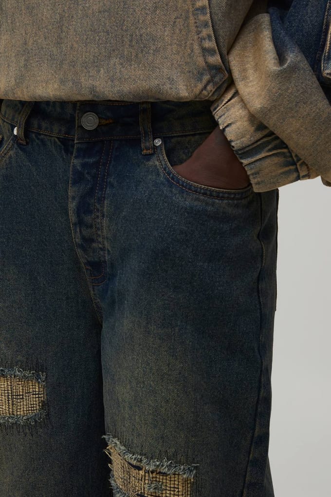 Relaxed Rip & Stitch Repair Jeans | Mid Wash | Size 44S