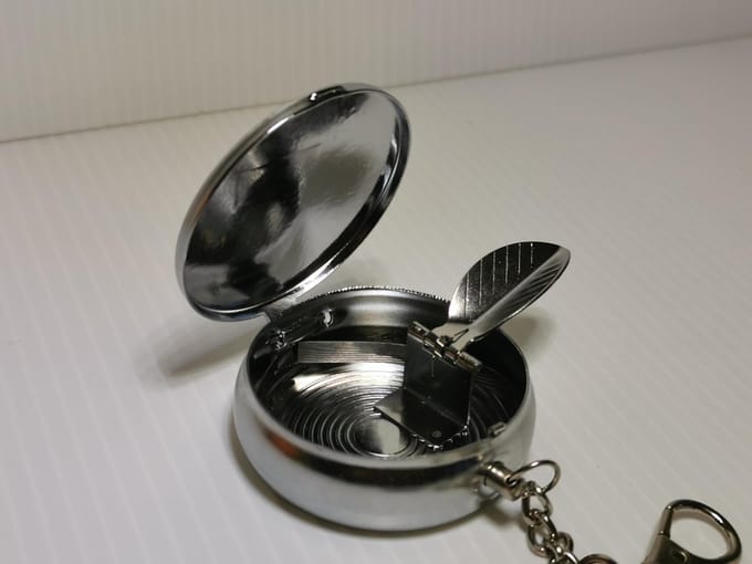Zakasbak met sleutelhanger