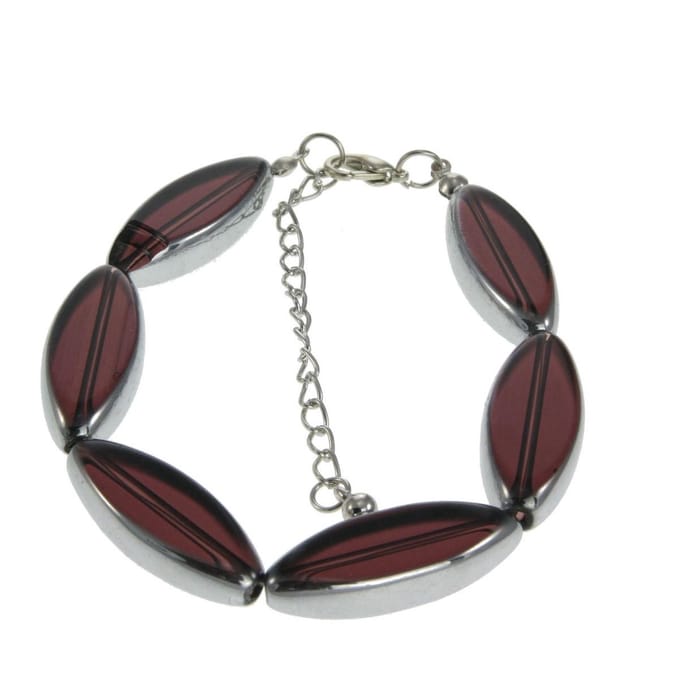 Behave - armband met ovaal rode stenen - elegant bij avondkleding