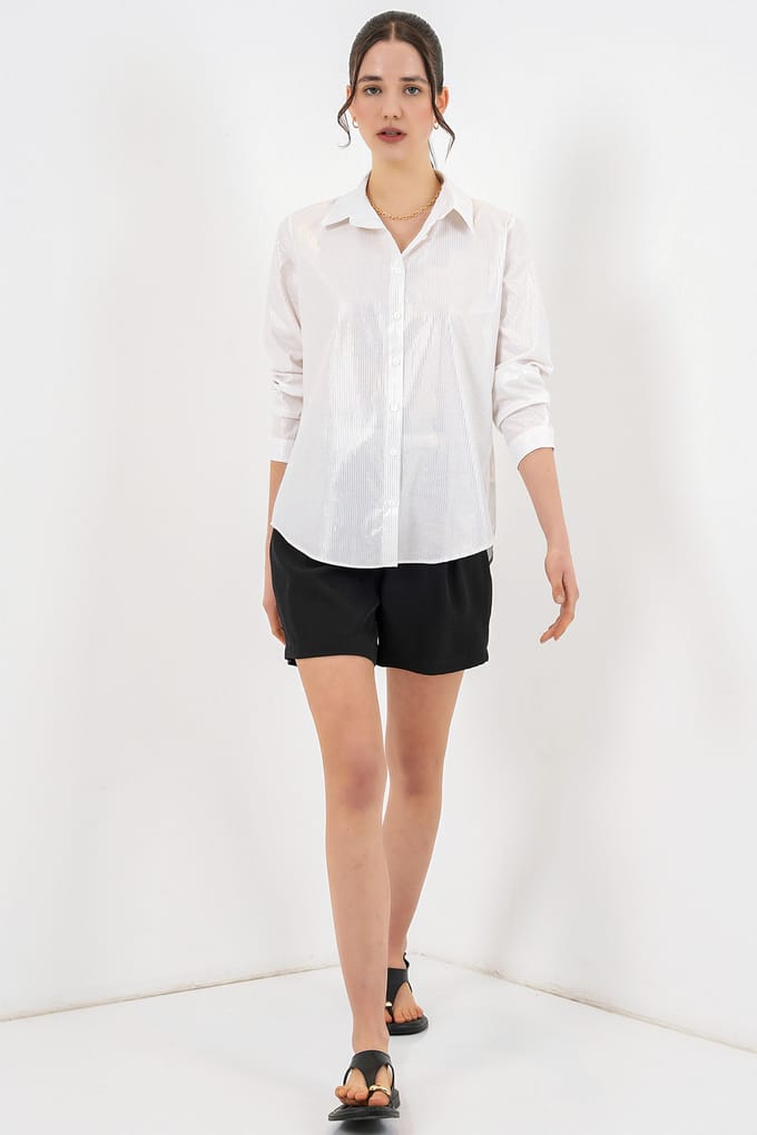 Oversized gestreepte blouse met knopen