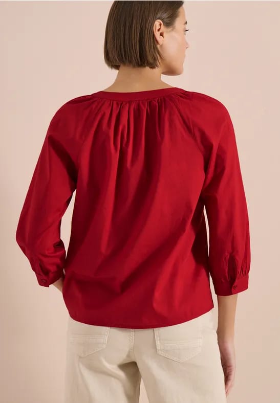 Blouse met 3/4 mouwen en gespleten hals in effen kleur