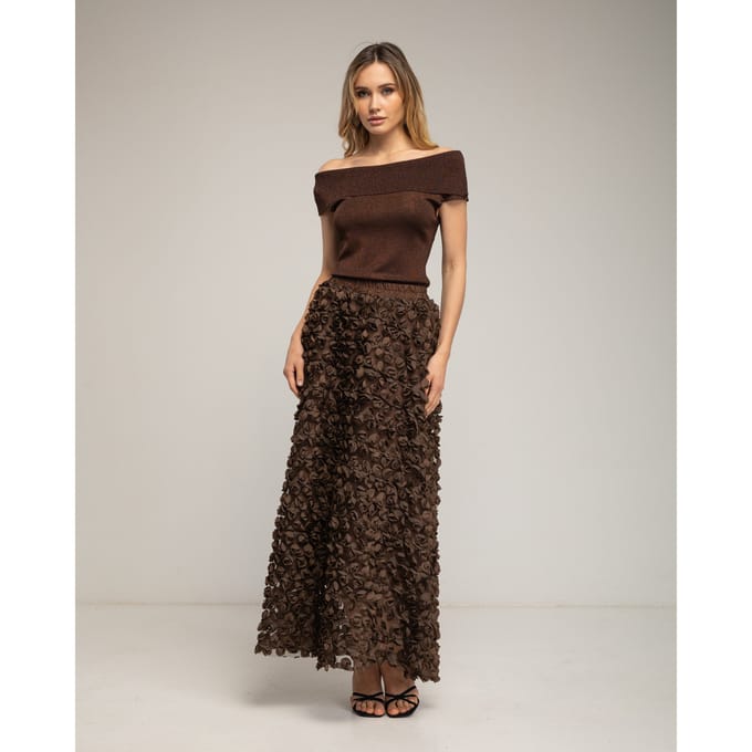 Lange A-lijn rok van organza met bloemen en een elastische taille.