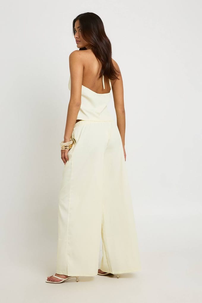 boohoo Dames Getextureerde Geweven Haltertop En Wijde Broek Set | Citroen | Maat: 38