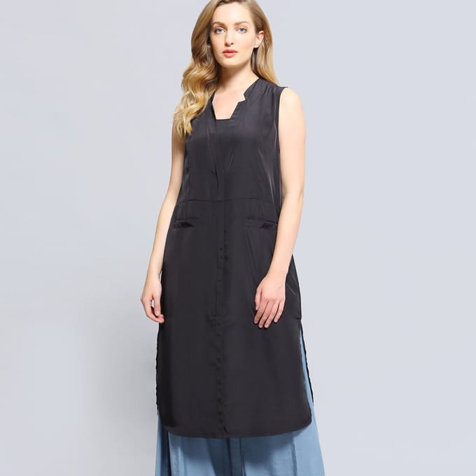 Lange bi-materiële vest