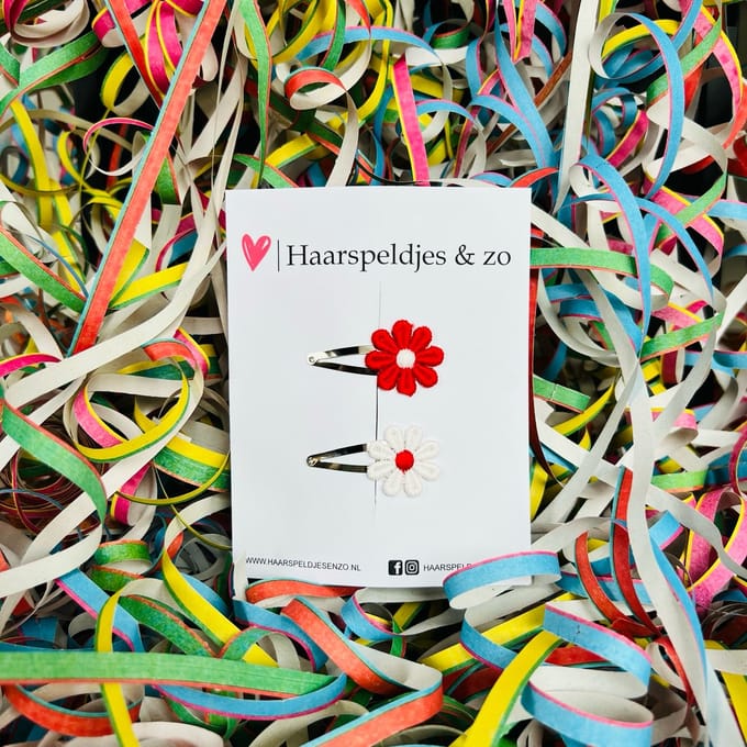 Klikklakspeldjes met rood/witte madeliefjes - carnaval - Ut Malse Arckeldurp — 4 cm