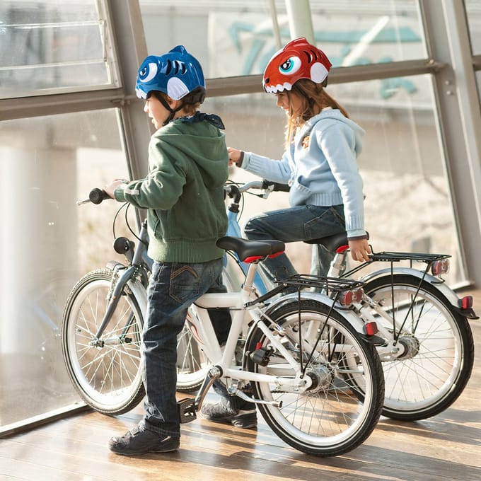 Wozinsky Children's bicycle helmet dinosaur motif 52-56 cm - red