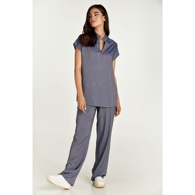 Blauwe mouwloze top in denimstijl
