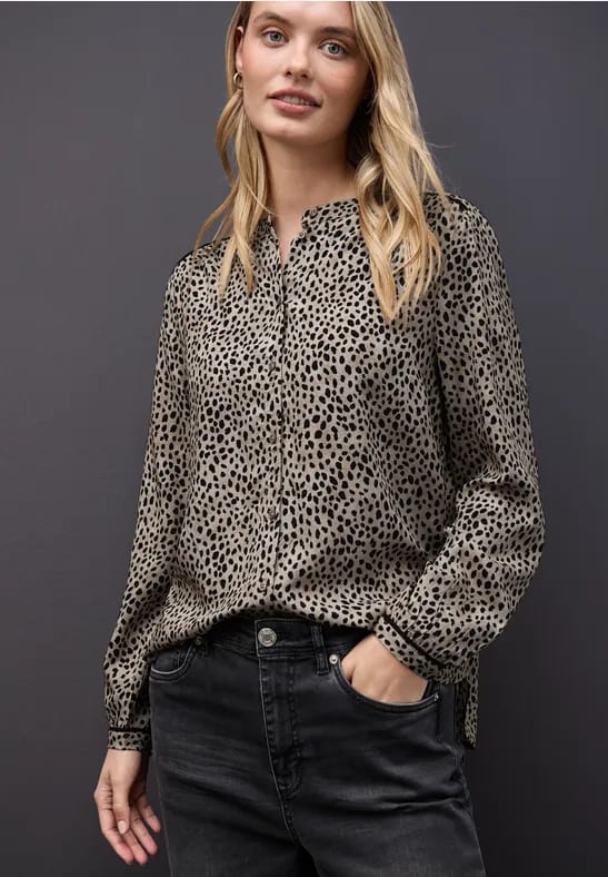 Leo blouse met taping details