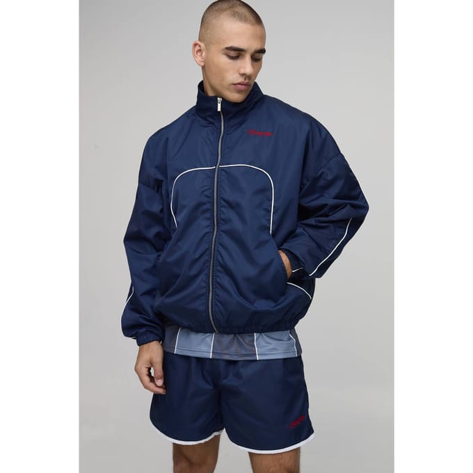 Boxy Shell Trainingspak Met Geborduurd Naaddetail, Col En Dubbele Rits Kort Model | Navy | Size Medium