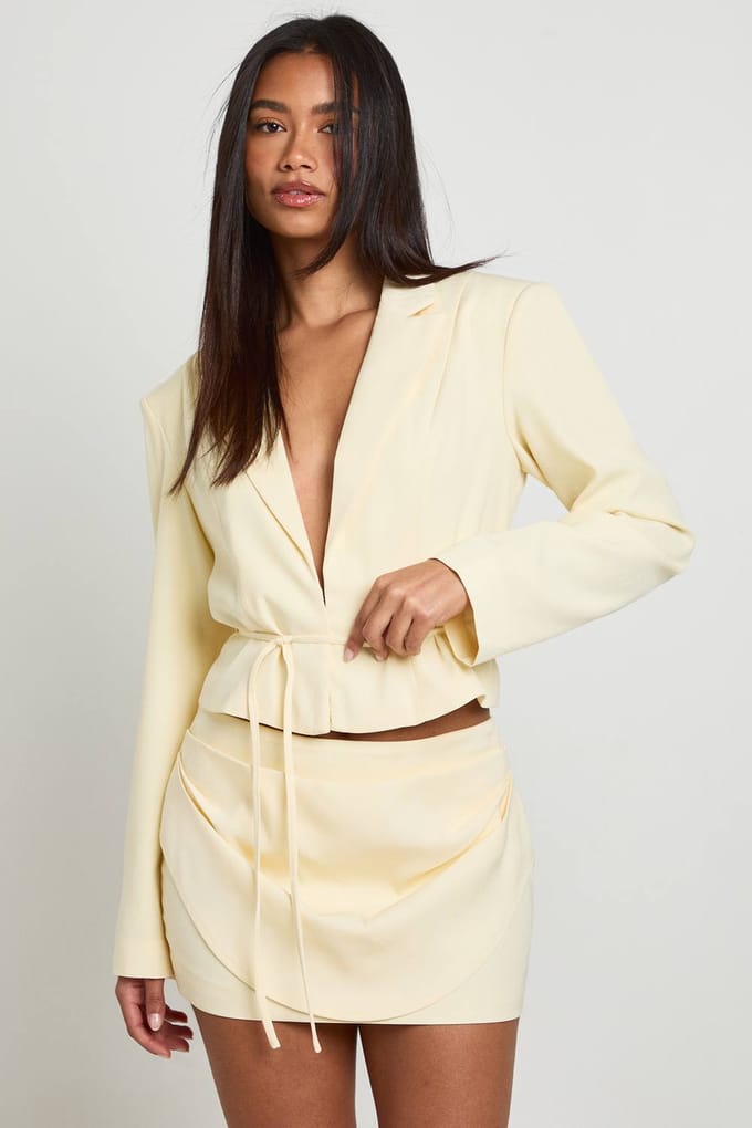 boohoo Dames Gedrapeerde Getailleerde Minirok | Citroen | Maat: 36