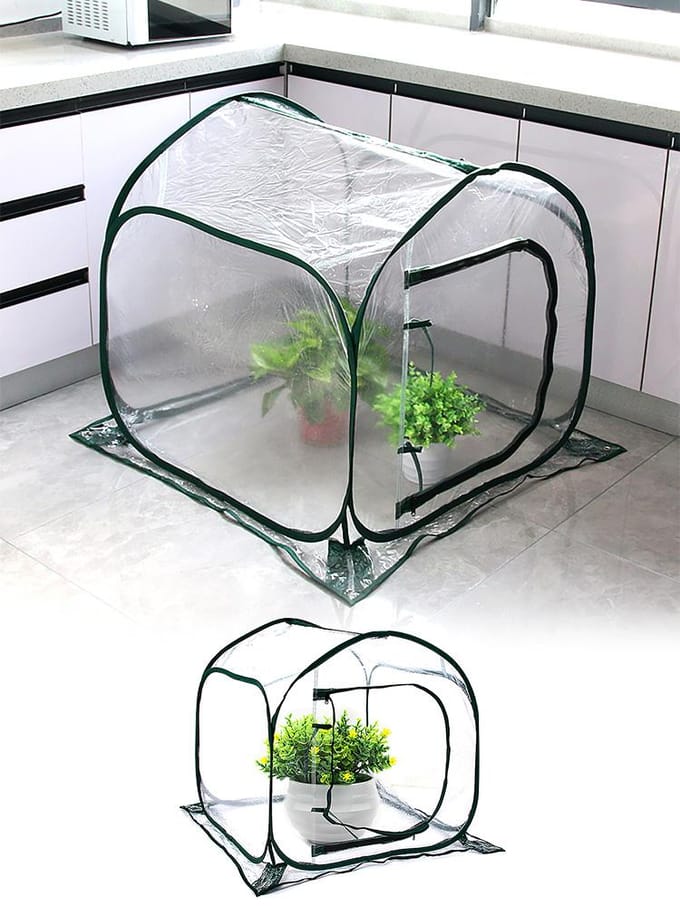 Mini serre de jardin transparente isolée et chaude