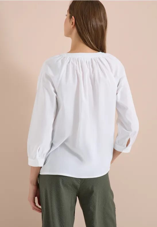 Blouse met 3/4 mouwen en gespleten hals in effen kleur