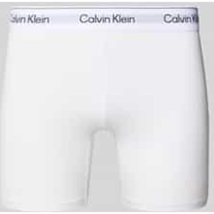 Broek met label in band