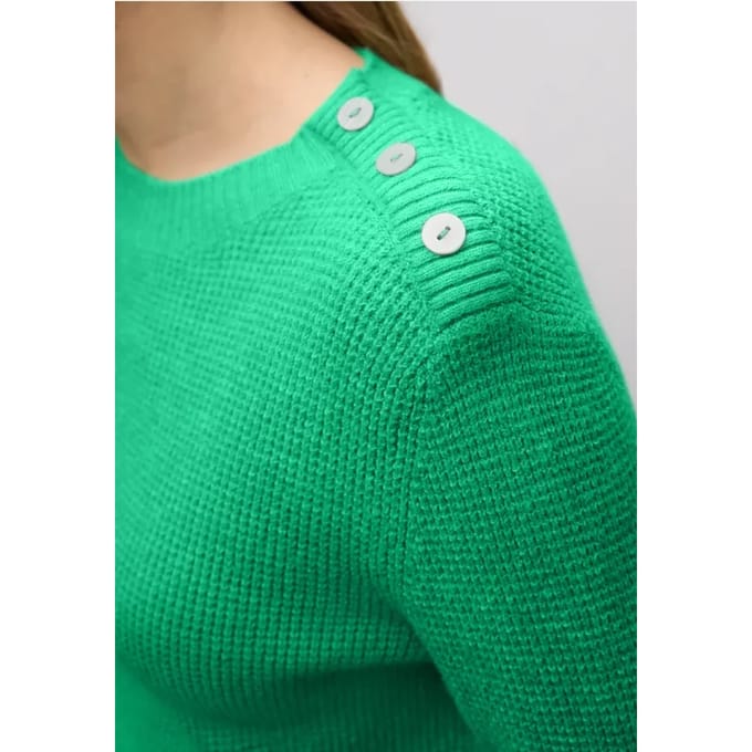 Trui met knoopdetail