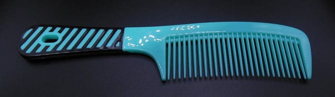 Grote handvat kam neon turquoise-zwart