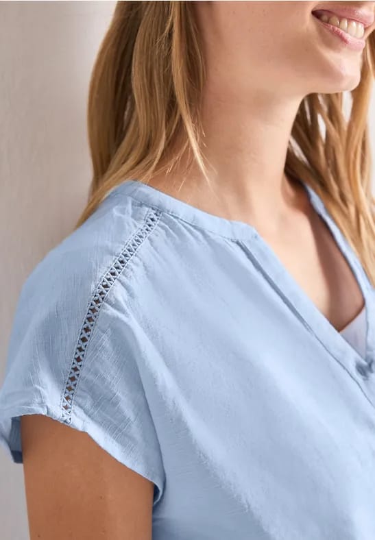 Blouse met overhangende schouder en tape