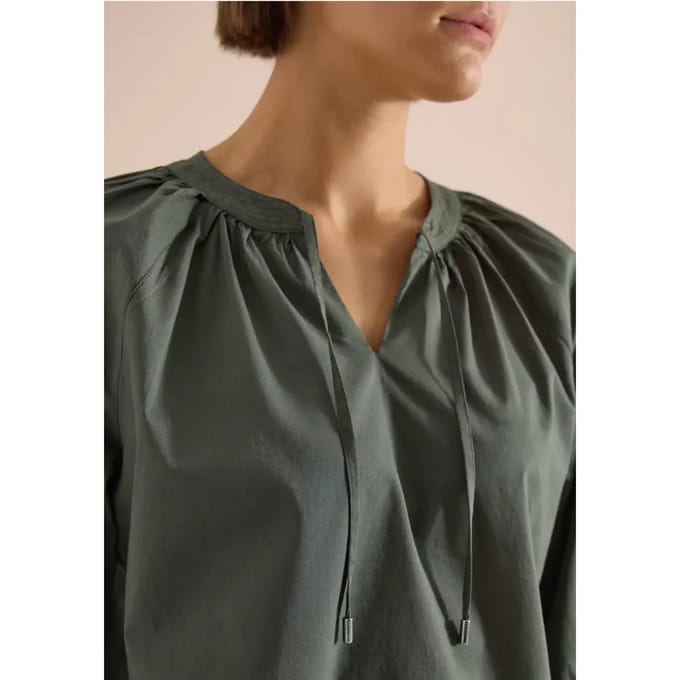Blouse met 3/4 mouwen en gespleten hals in effen kleur