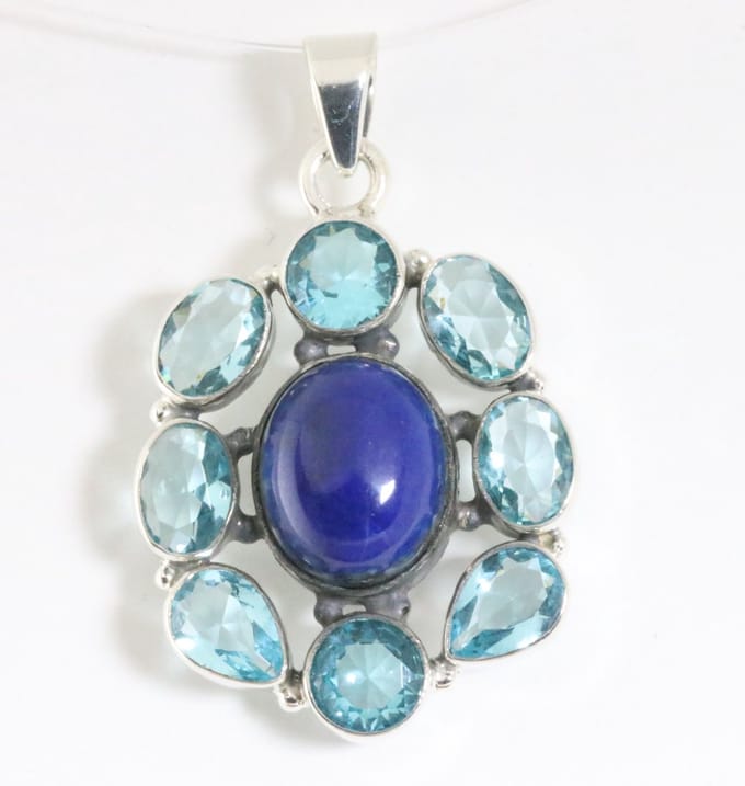 Zilveren hanger met lapis lazuli en blauwe topaas